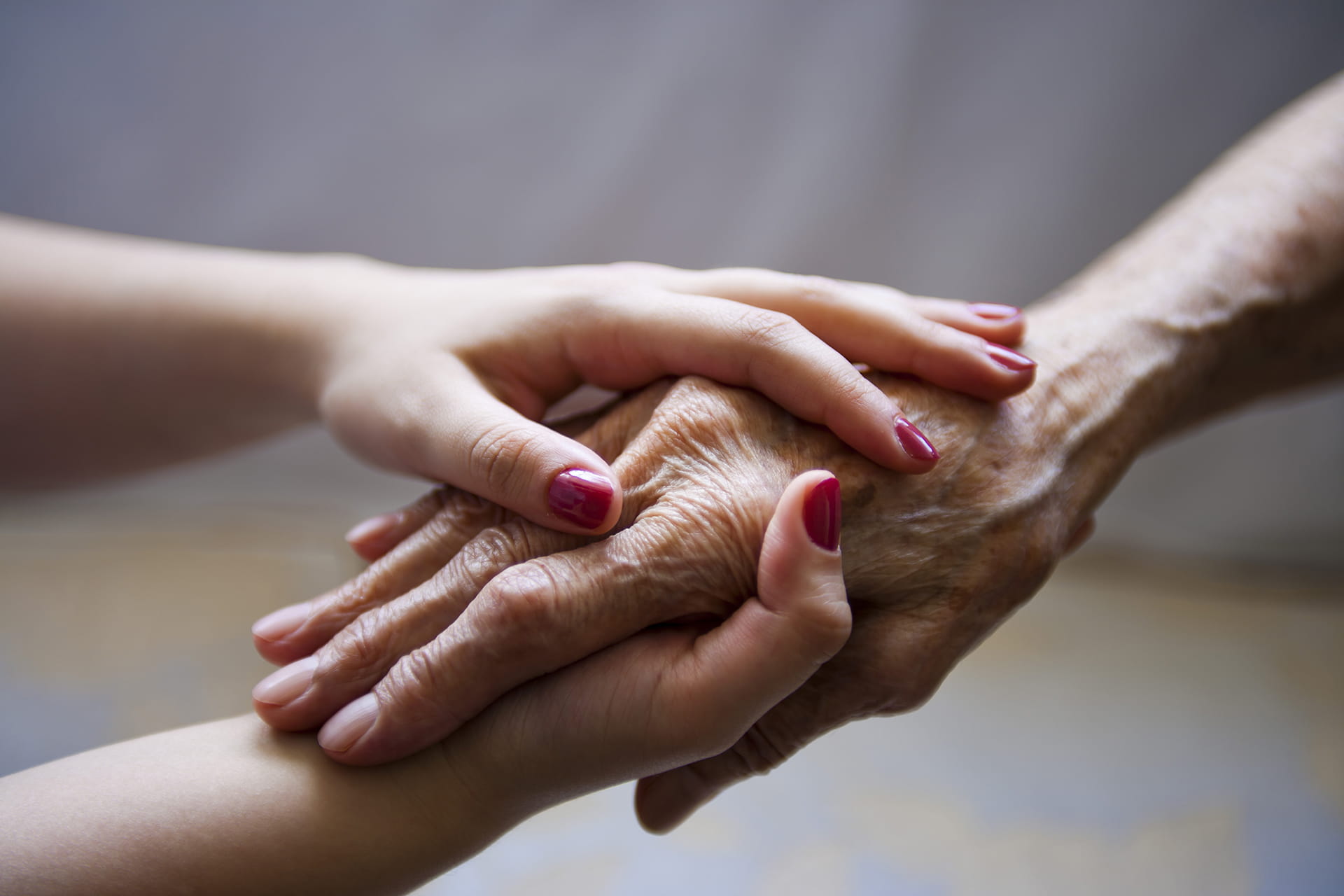 Two people holding hands