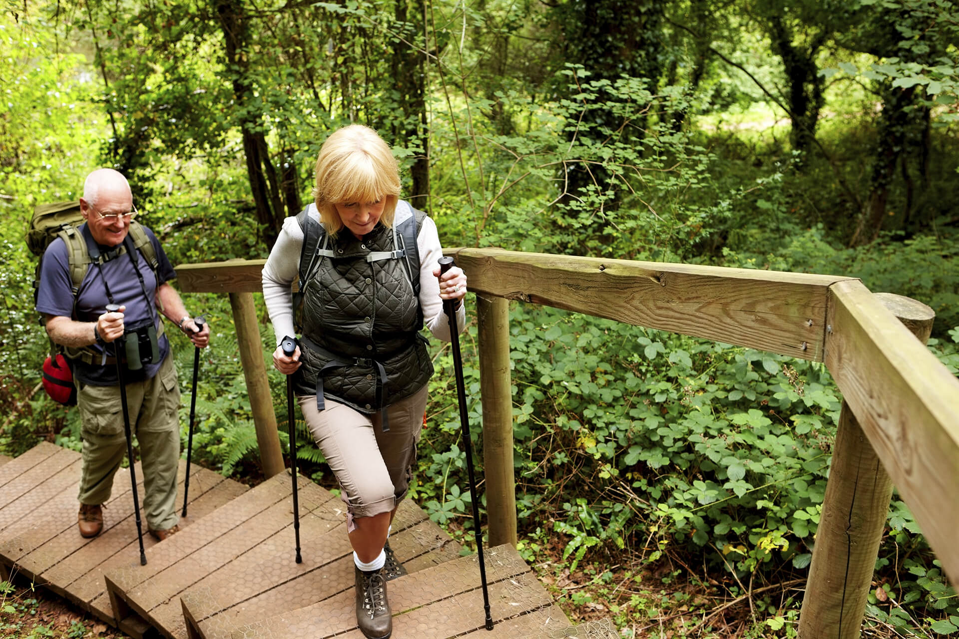 Two elderly hiking
