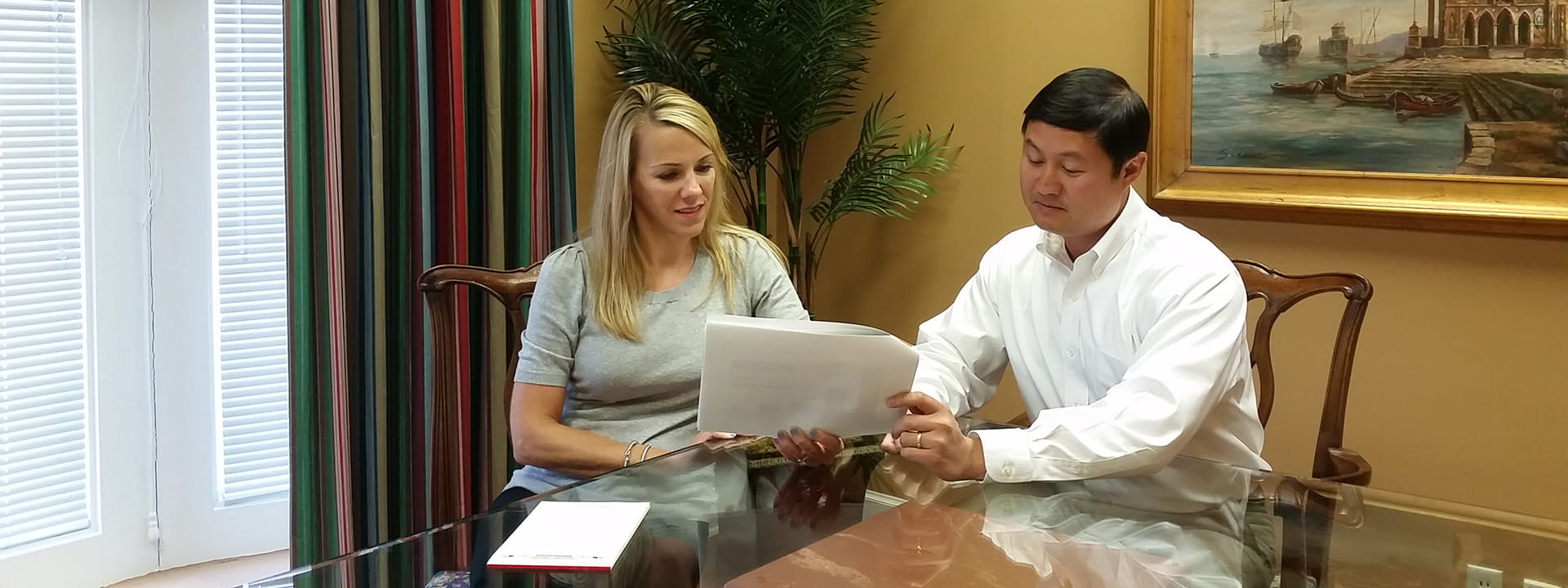 Barnes Pettey Financial Advisors reviewing a document